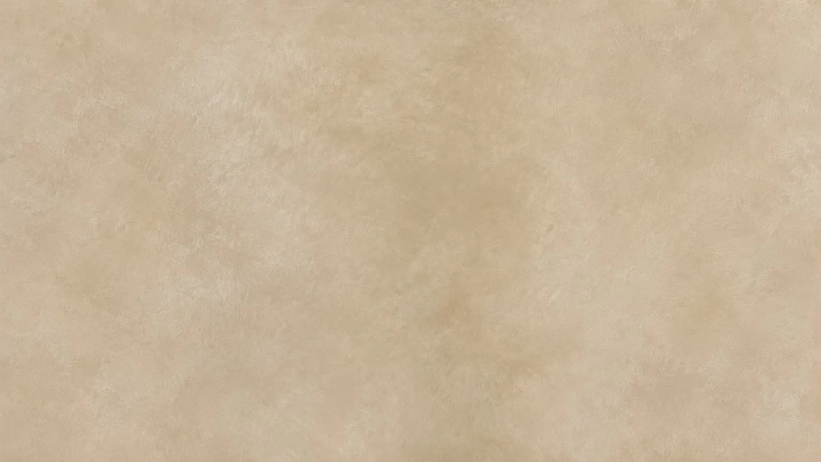 Close-up of warm sand limewash with soft, cloudy tonal movement